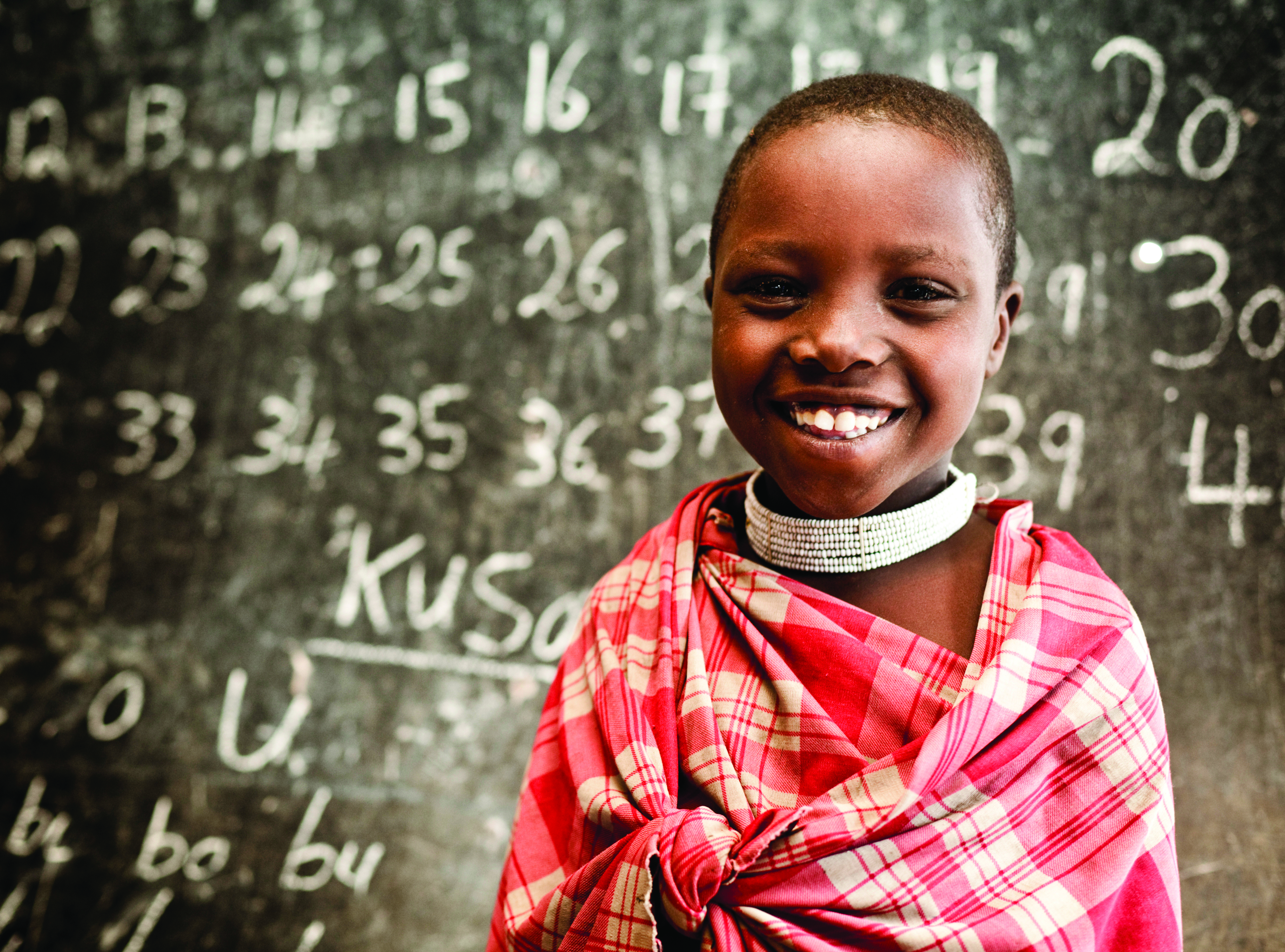 African Child Learning Numbers at School