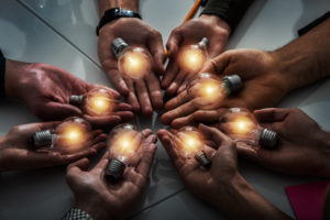 Glows Bulb in hands
