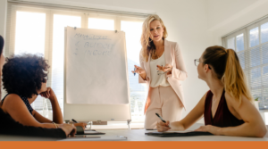Workplace Training Photos (1100 x 612 px) (6) Leader in meeting